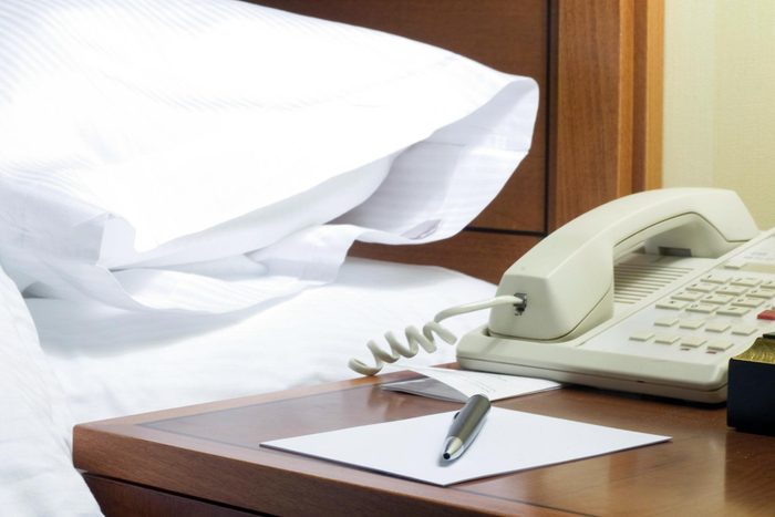 Hotel Nightstand Gettyimages 172803649 Mledit