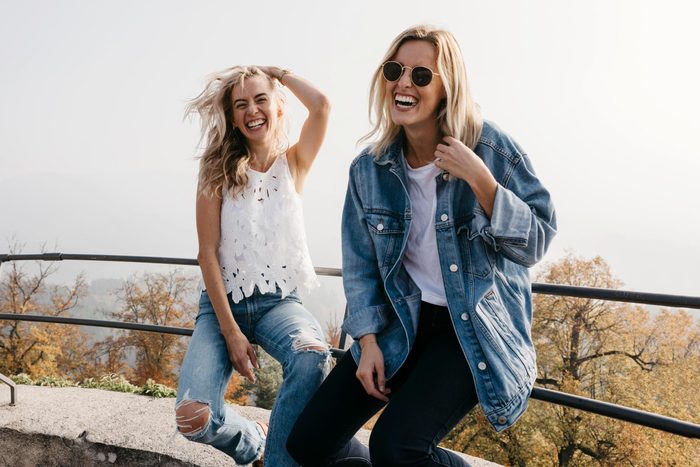 women sitting on railing at Sausenburg Castle