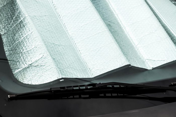 sun reflector in the windshield of a car