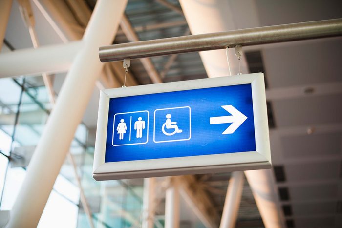 Airplane travel tip bathroom sign