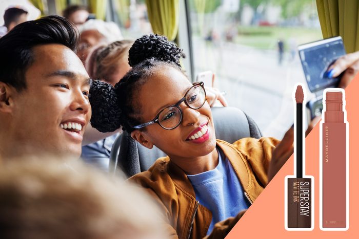 woman in glasses wearing bright lipstick