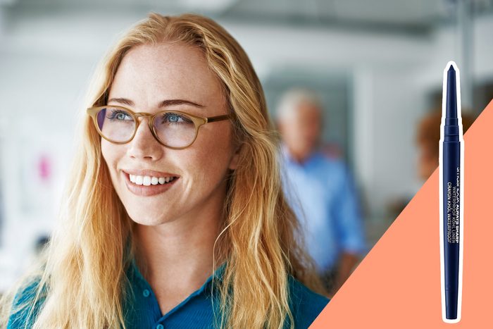 woman wearing glasses with inset of blue eyeliner