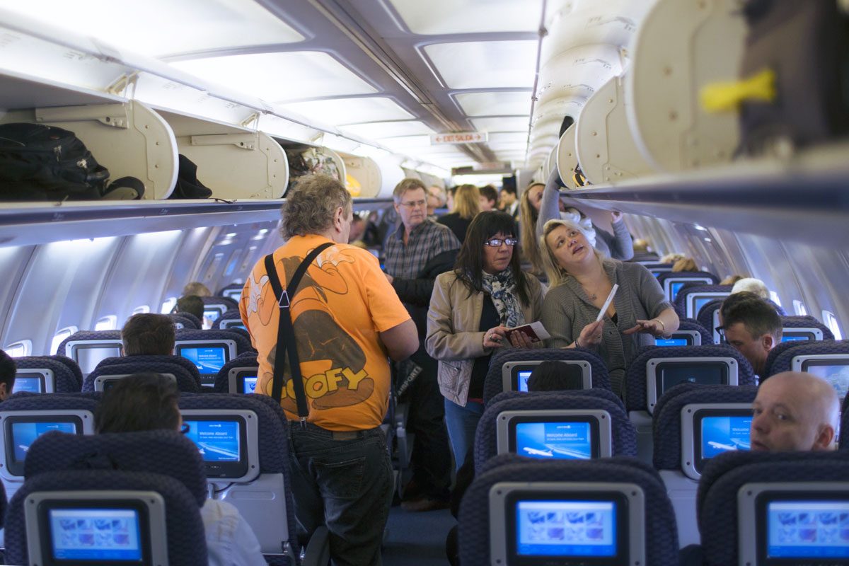 Passengers board a United Airlines plane to New York at the Oslo Airport Gardermoen March 9, 2013 in Oslo, Norway