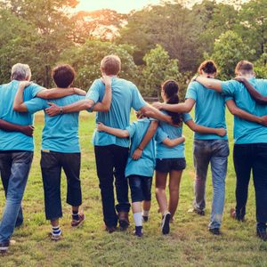 Group of diversity people volunteer arm around