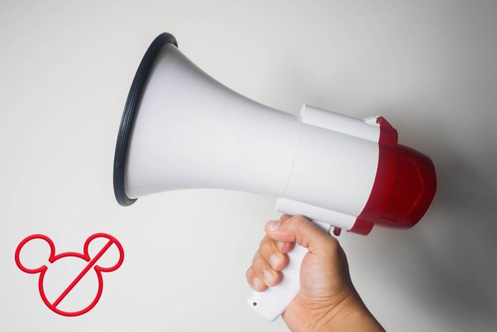 hand holding up a megaphone
