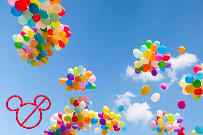 bunches of balloons floating away