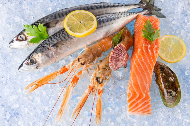 Fresh seafood on crushed ice, close-up.