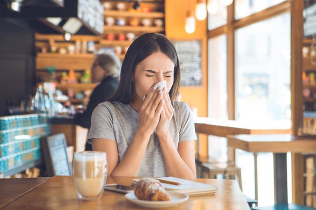  Young woman sitting in a coffee shop leisure