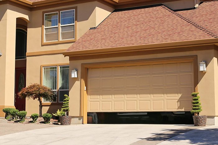 Open garage door in suburban family home