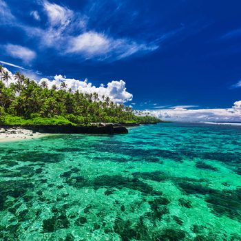 Beach with coral reef on south side of Upolu, Samoa Islands