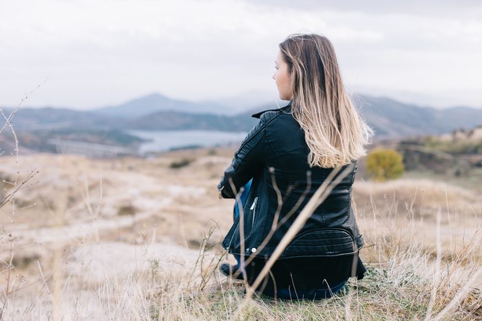 Woman enjoying the view of the beautiful landscape