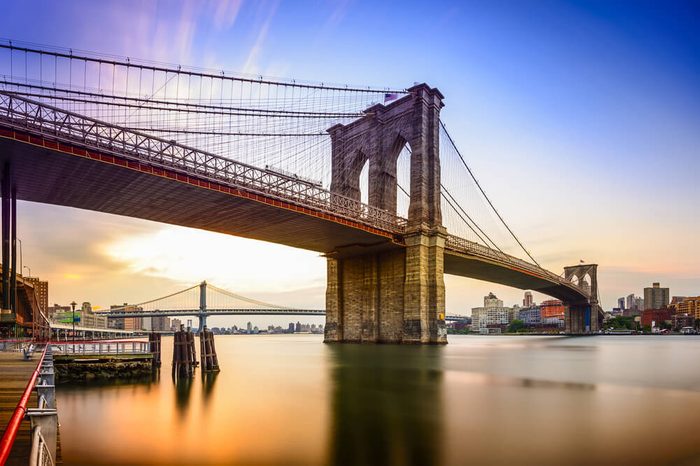 Brooklyn Bridge in New York City at dawn.