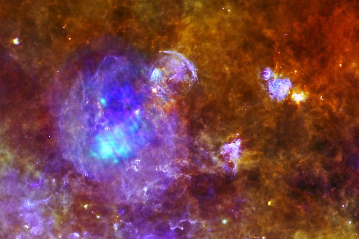W44 is located around 10,000 light-years away, within a forest of dense star-forming clouds in the constellation of Aquila, the Eagle. This image combines data from ESA Herschel and XXM-Newton space observatories.
