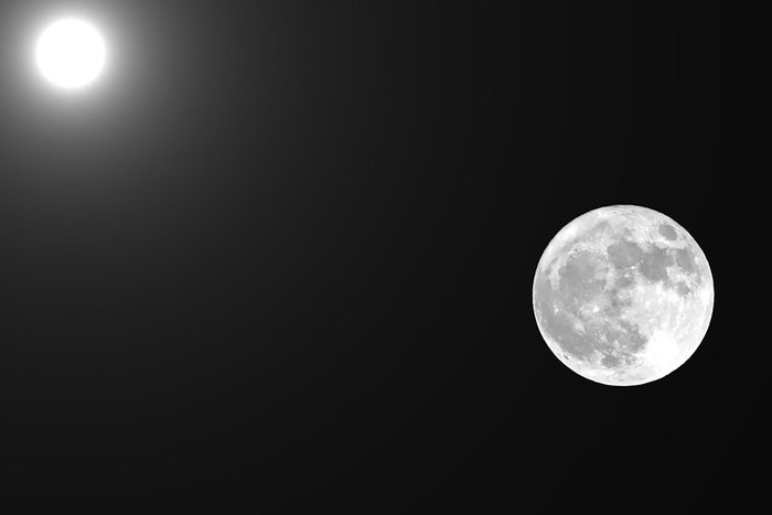 full moon and the sun in the same photographic frame