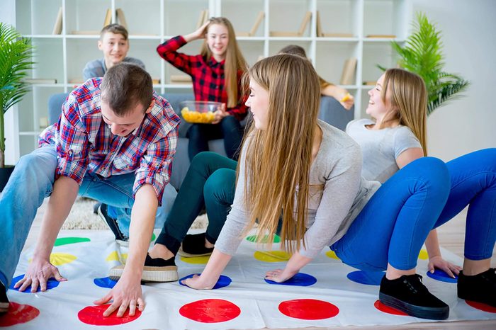 Friends playing twister