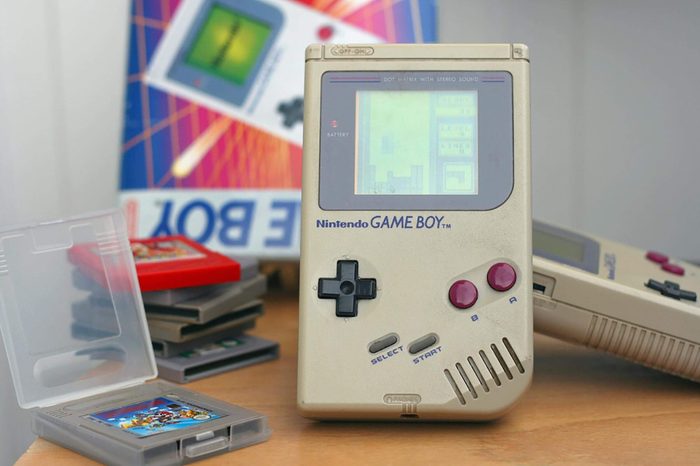 LJUBLJANA, SLOVENIA - DECEMBER 30, 2013: Photo of an original Nintendo handheld video game device Game boy (1989) with Tetris game playing.Showing obvious signs of longtime use.