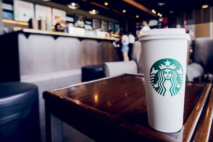 CHIANG RAI, THAILAND- JUNE 23, 2017 : A Venti Starbucks coffee in Starbucks coffee shop.