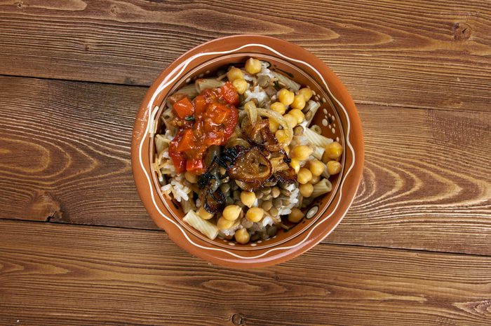 Kushari - is an Egyptian dish of rice, macaroni and lentils mixed together, topped with a tomato-vinegar sauce; some add short pieces of spaghetti garnished with chickpeas and crispy fried onions