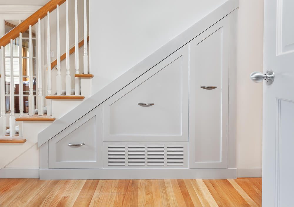 Gliding under stair pullout cabinets for kitchen small appliance storage