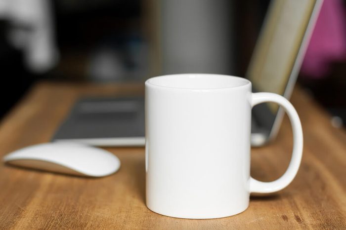 White mug on the desktop