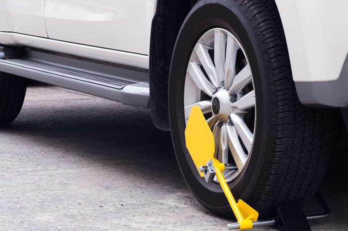 This car has been wheel-cramped because of illegal parking