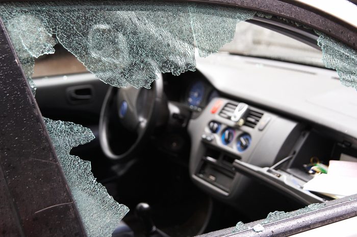 Night crime - the broken window of the car and abduction of things from a box on the forward panel