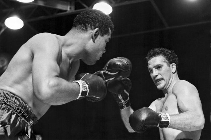 New York, New York: June 19, 1946. Heavyweight champion Joe Louis is about to deliver the knockout punch to challenger Billy Conn in their championship bout at Yankee Stadium.