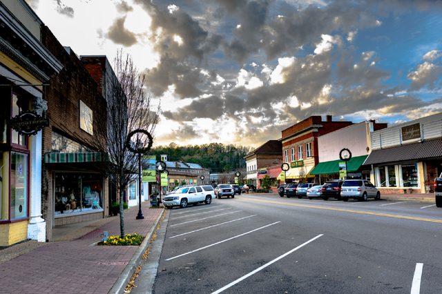 Prattville, Alabama, USA - December 26, 2016: A view down Main Street at sunset with the street and storefronts still decorated for Christmas.