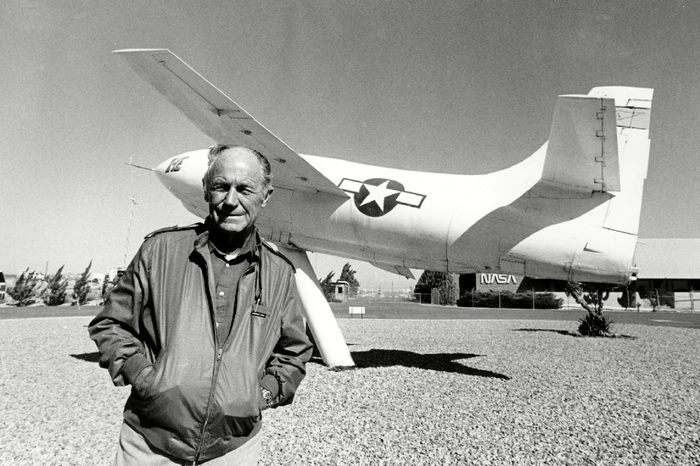 Yeager Chuck Yeager, the first pilot to break the sound barrier in 1947, poses in front of the rocket-powered Bell X-IE plane that he flew at Edwards Air Force Base on