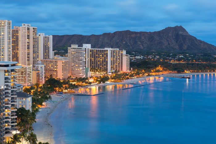 Scenic view of Honolulu city, Diamond Head and Waikiki Beach at night; Hawaii, USA