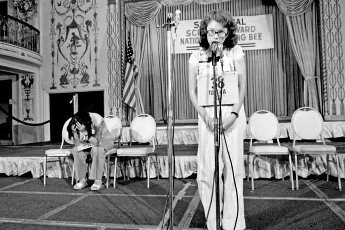 Peg McCarthy, Lyn Sue Kahng Peg McCarthy of Topeka, Kansas, spells the world "deification" to win the 51st National Spelling Bee in Washington, D.C., . The runner-up Lyn Sue Kahng, seated left, puts her head in her hands. Kahng is from San Diego