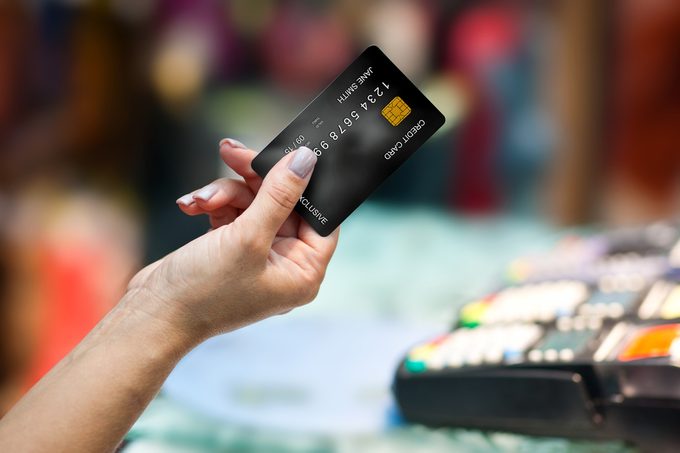 close up of woman hand holding credit card