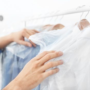 Employee working at dry-cleaner's