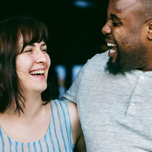 Happy couple laughing together