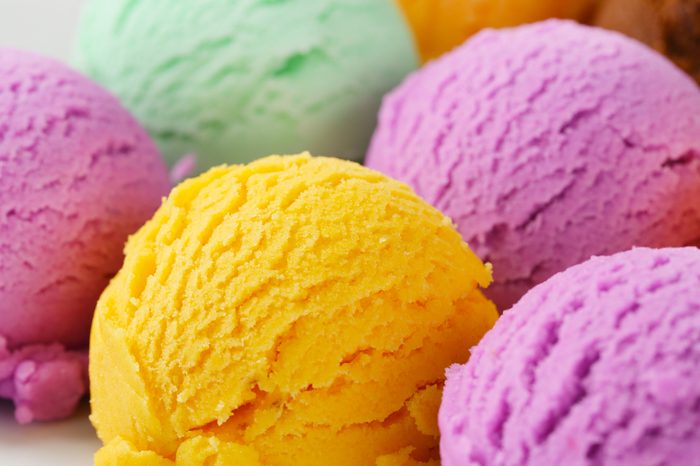 Group of ice cream scoops on a rectangular white plate