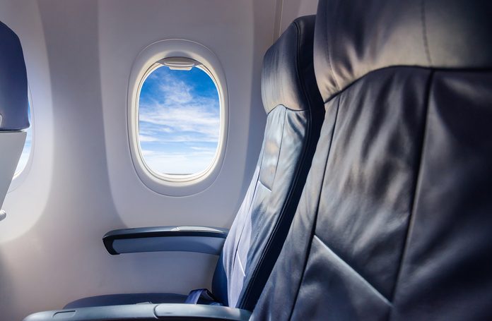 empty seat airplane and window view inside an aircraft