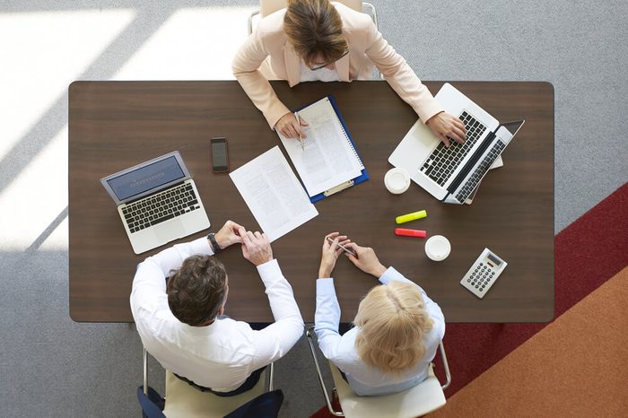 Top view of professional investment advisor woman consulting about financial plan with business management. 