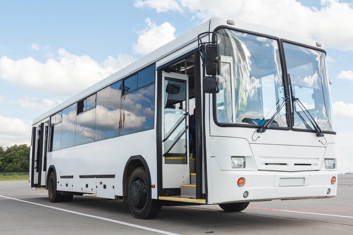 white airport bus close up