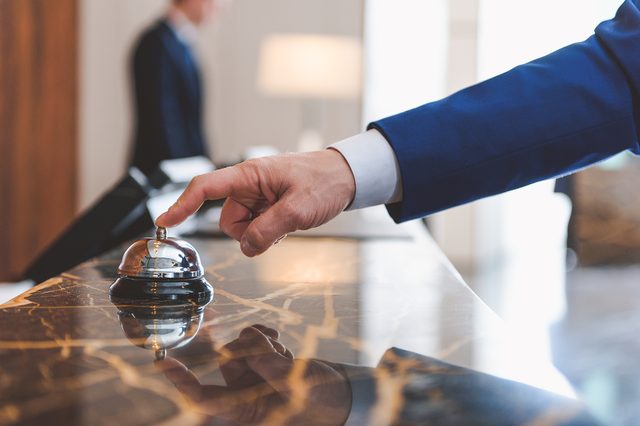 Businessman in suit expecting receptionist