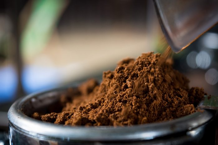 Coffee while grinding in a coffee machine grinder