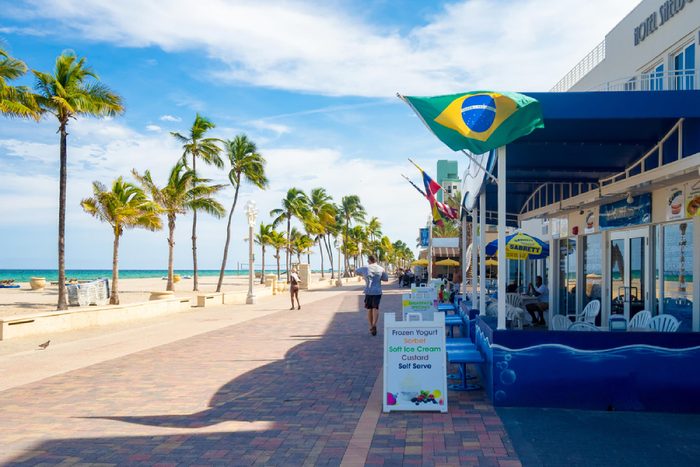 HOLLYWOOD BEACH,USA - AUGUST 25,2015 : The famous Hollywood Beach boardwalk in Florida on a summer day