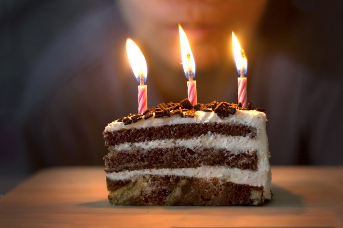  Blow out candles on birthday Cake