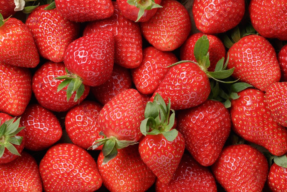 background from freshly harvested strawberries, directly above