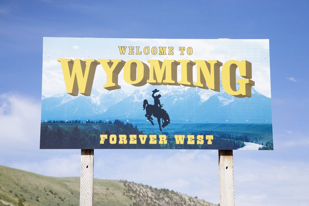 Close-up of welcome to Wyoming road sign