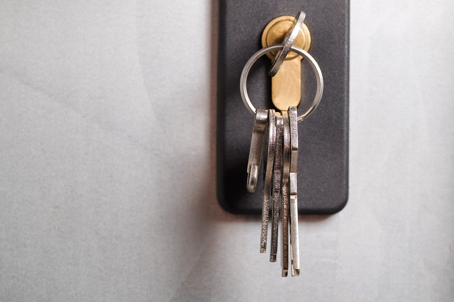Keys stuck in a lock. The photo shows a macro detail