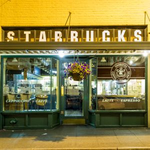 SEATTLE - JULY 5: Original Starbucks store at 1912 Pike Place on July 5, 2014 in Seattle. Serving coffe in 20.891 stores in 62 countries, Starbucks is world's largest coffeehouse company.