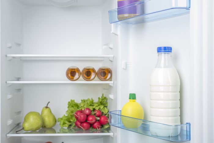 Open fridge full of fresh fruits and vegetables, healthy food background, organic nutrition, health care, dieting concept