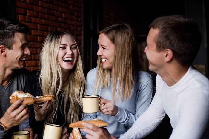 four friends laughing