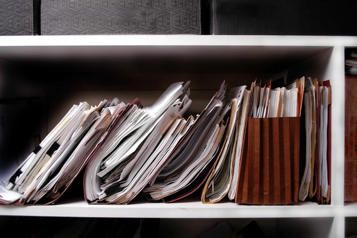 Office shelves full of files and boxes