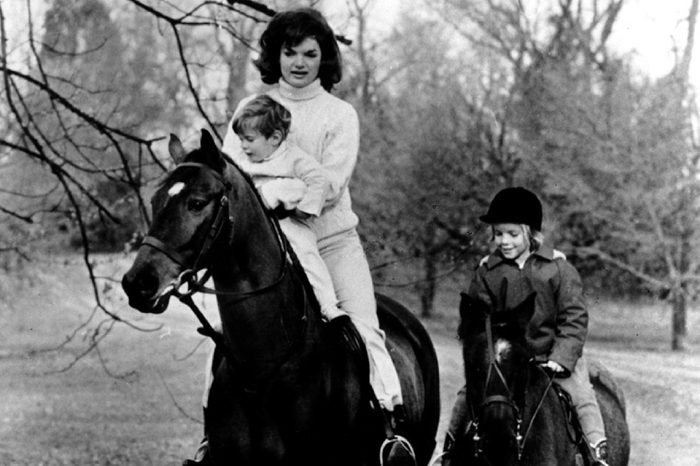 First Lady Jacqueline Kennedy and her children John F. Kennedy Jr. and Caroline Kennedy riding.